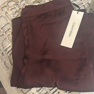 Calvin Klein Satin Pants. Color: Burgundy Size: XS. Brand new never worn